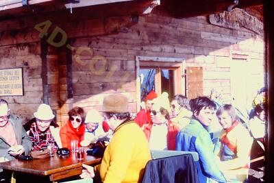 Vintage slide photo Colorful Après-Ski Gathering in Mountain Lodge