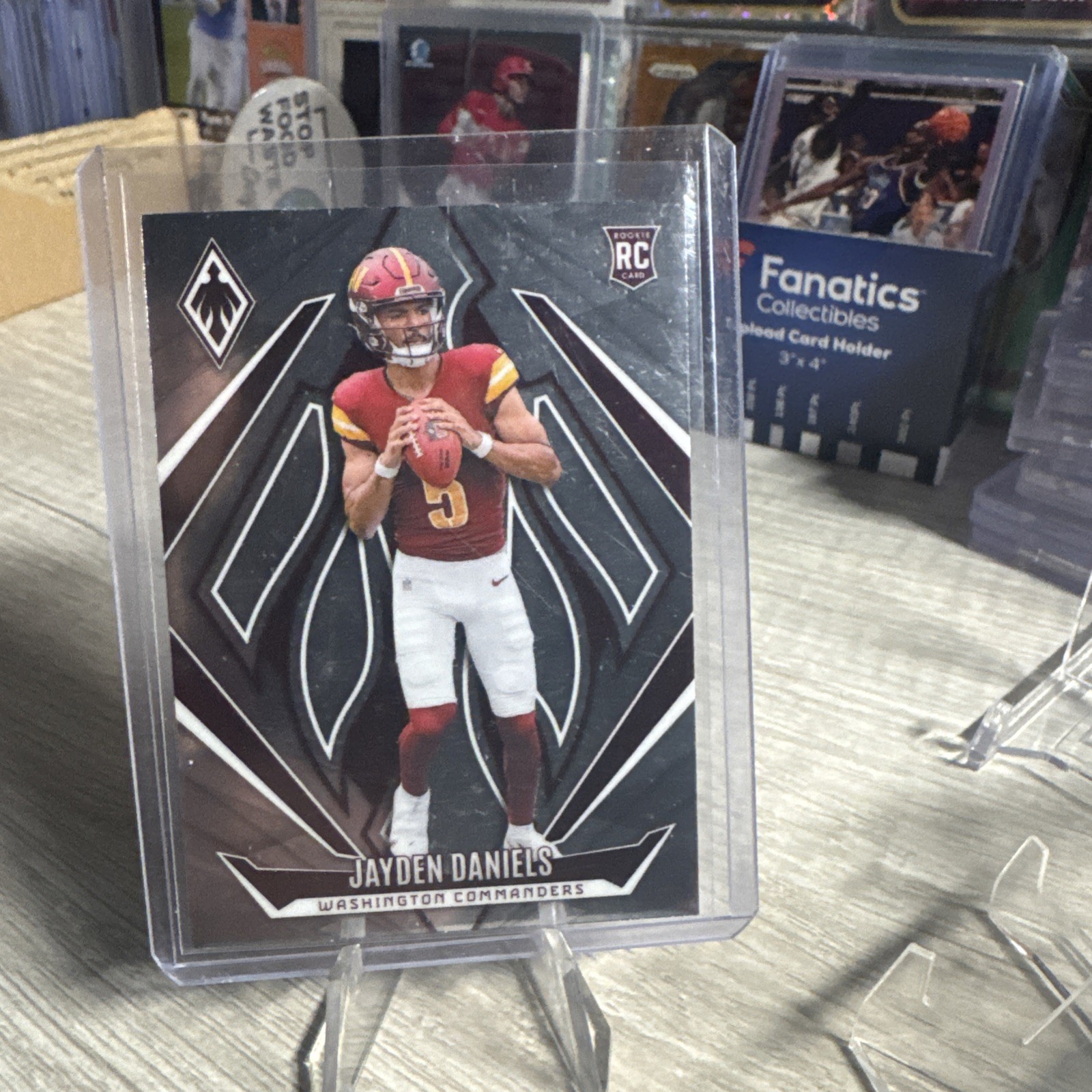 2024 Panini Phoenix - Rookies Jayden Daniels #198 Silver (RC)