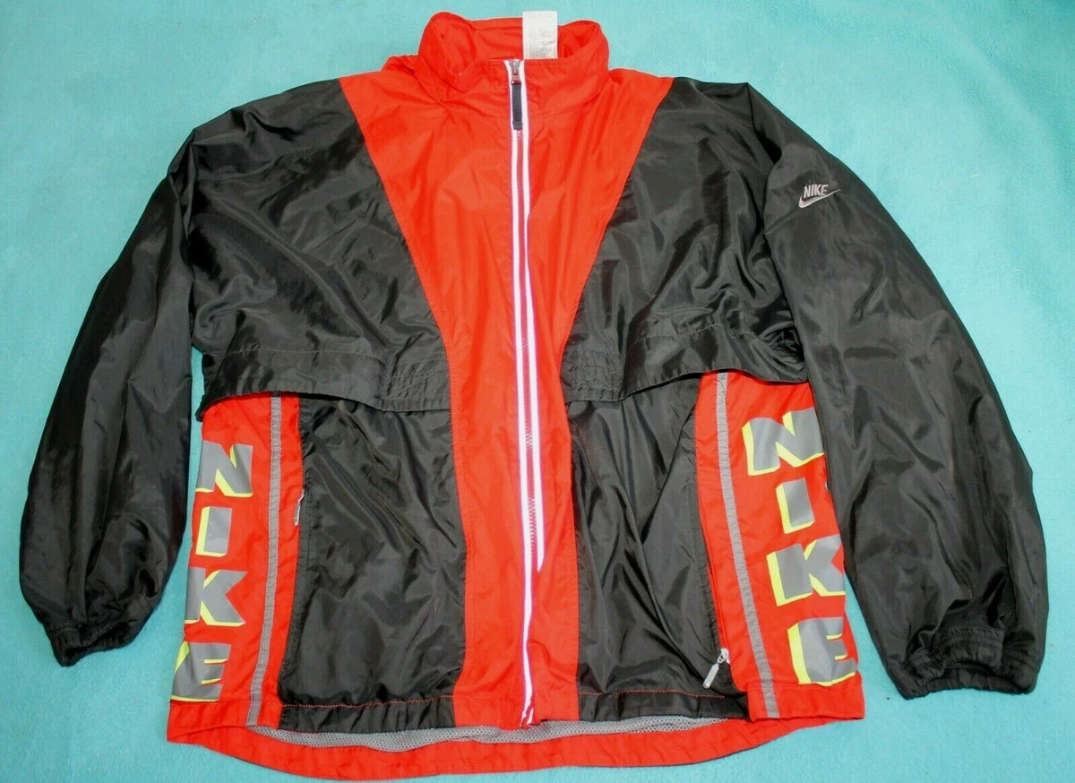 Nike tracksuit black and orange sale