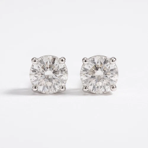 1/4 - 2 Ct T.W. Natural Diamond Studs in 14k White or Yellow Gold