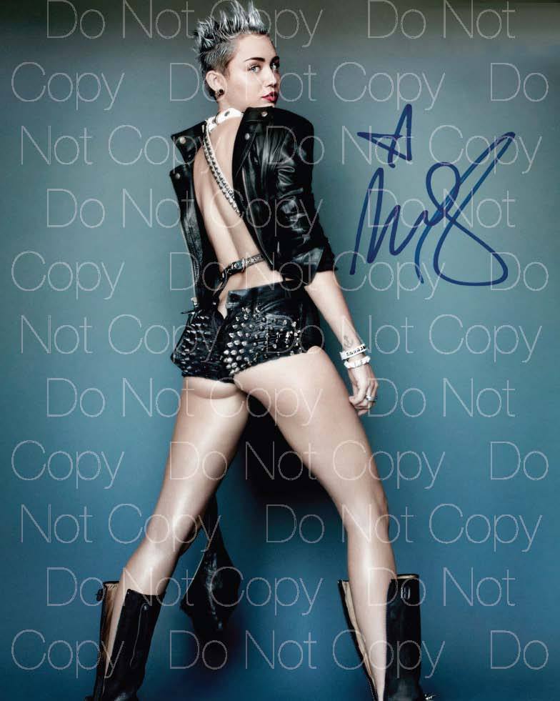Miley Cyrus 直筆サインフォト Miley Cyrus 直筆サインフォト