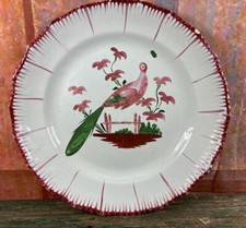 LES ISLETTES EASTERN FAIENCE PLATE DECOR A PEACOCK ON A BARRIER