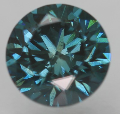 Cert 0.70 Carat Vivid Blue VVS2 Round Brilliant Enhanced Natural Diamond 5.54mm