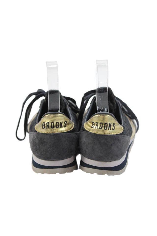 Zapatillas deportivas Brooks para mujer con cordones ribete metálico acolchadas de gamuza azul marino dorado talla 6 Foto 3 de 4