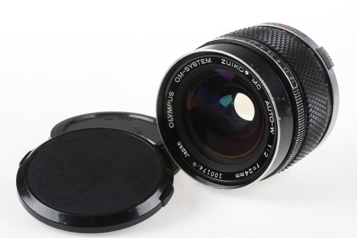 OLYMPUS OM Zuiko 24mm f/2,0 Auto-W - SNr: 100174 | eBay