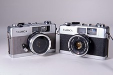 2 Collectible Rare Grey Yashica 35 ME Camera's w/ 35mm f2.8 Yashinon lens