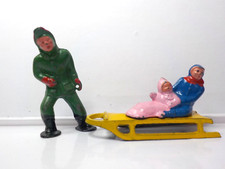 Barclay lead Christmas figures Man Pulling Mother  Daughter on Sled 40's or 50'