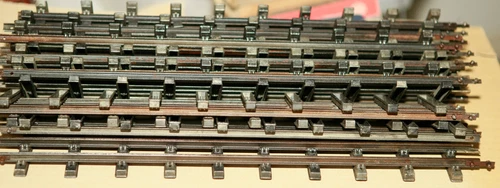 LIONEL O GAUGE SOLID T RAIL TRACK STRAIGHT WITH ALL THE NUTS BOLTS & FISH PLATES