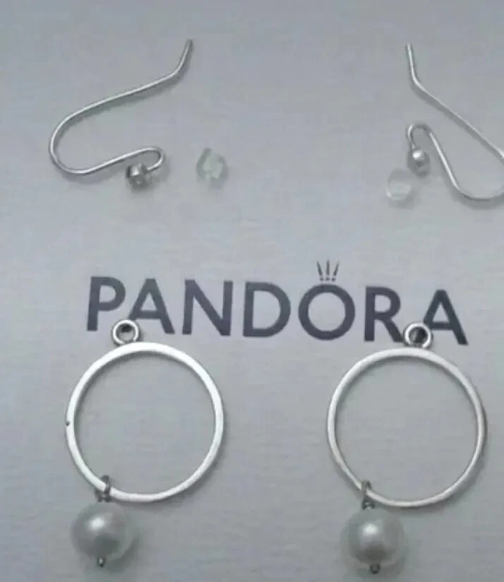 Orecchini pandora fuori produzione originali..perla D Acqua Marina - Immagine 3 di 3