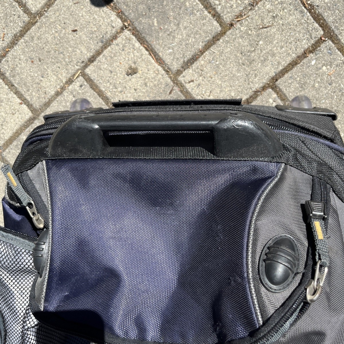 Valise de voyage trolley à roulettes bleu marine (Difettoso) a Lausanne
