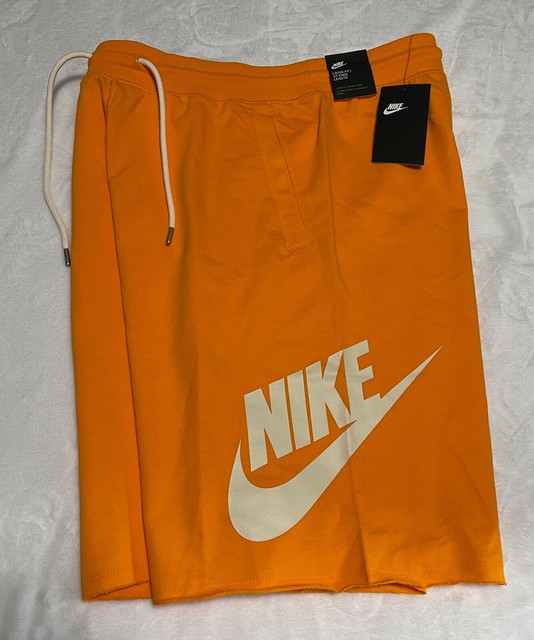 nike loose fit at knee length shorts
