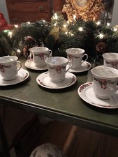 U R BUYING ONE SET Poinsettia  Ribbons    Fine-porcelain china 1 cup 1 saucer