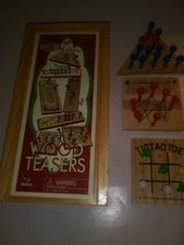 7 WOOD BRAIN TEASER GAMES IN BOX
