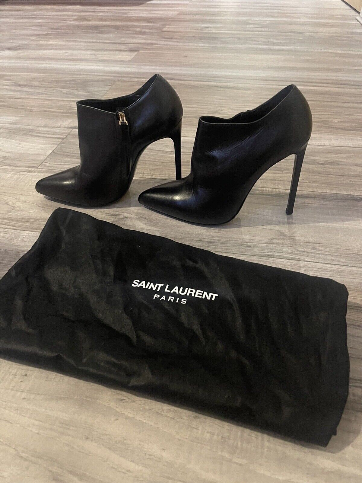 Stivaletti stiletto Saint Laurent misura 37 5€ con zip interna buone condizioni.