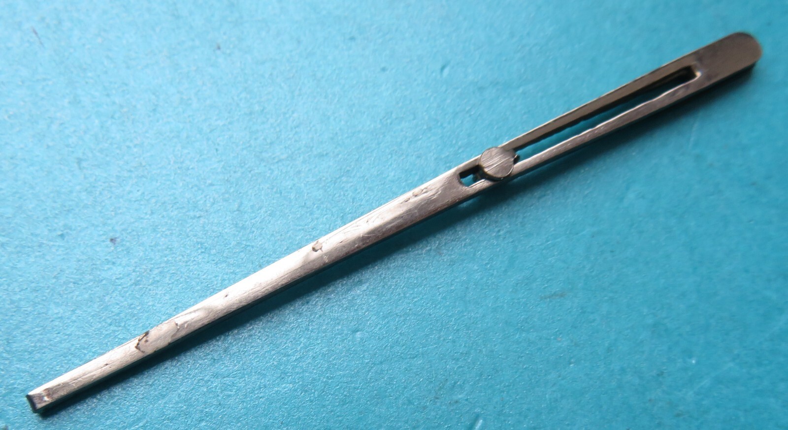 ANTIQUE METAL SLIDING BUTTON "THE DOT" SEWEING RIBBON THREADER TOOL. eBay