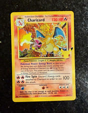 pokemon card charizard 4/102 Single: Base Set (1999) Holo DMG – Double Infinity Gaming Fire Fire Spin (100) Discard 2 Energy cards attached to Charizard in order to use this attack. Charizard #4/102 Shadowless 1st Edition