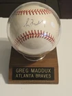 Greg Maddux AUTOGRAPHED Rawlings Baseball With Case