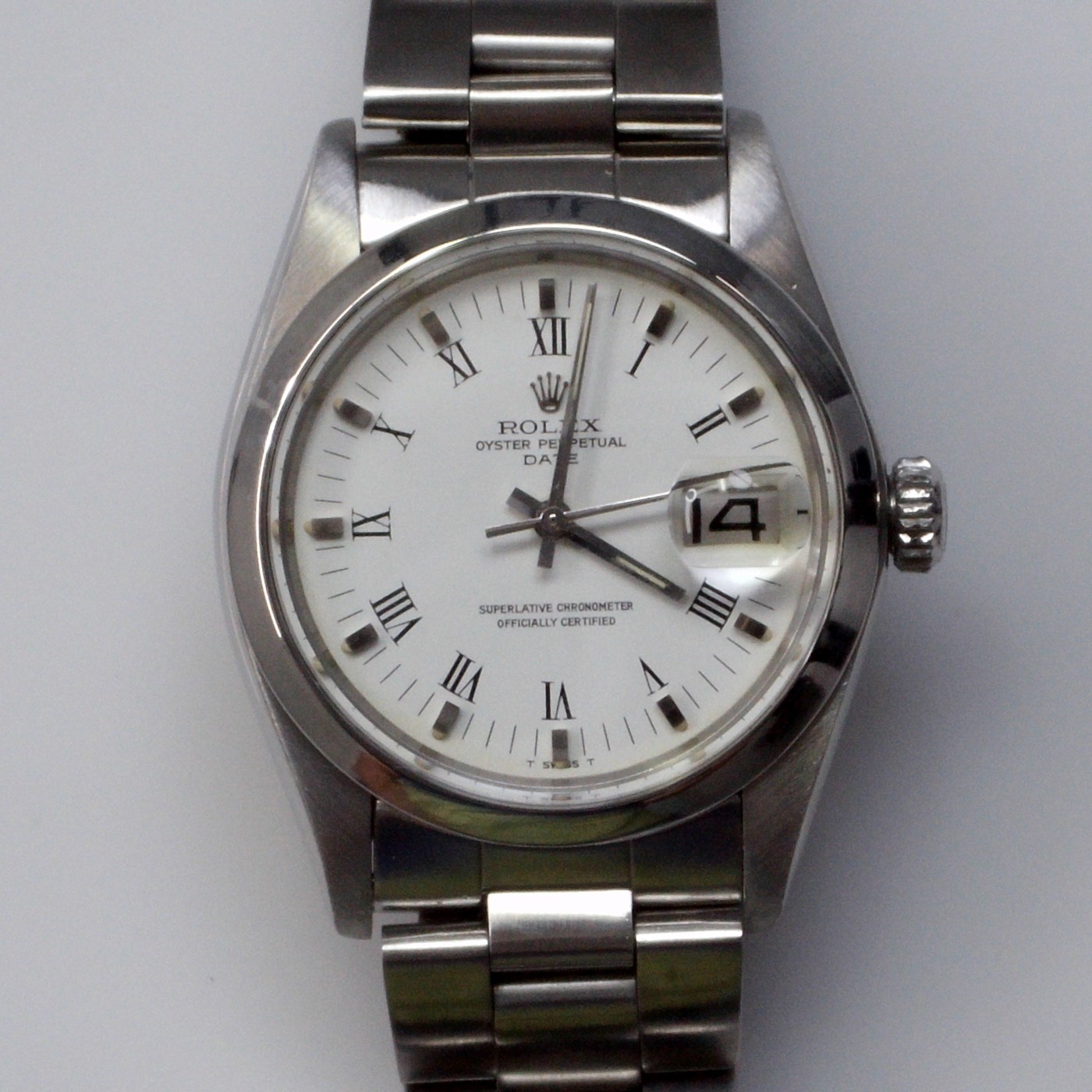 Rolex Date 34 mm Steel White Roman Oyster Automatic Watch 1500 Circa 1975