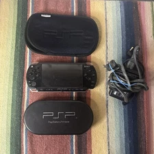 Sony PSP-2001 Slim Console + Charger + 32GB Memory Stick + Case – Tested