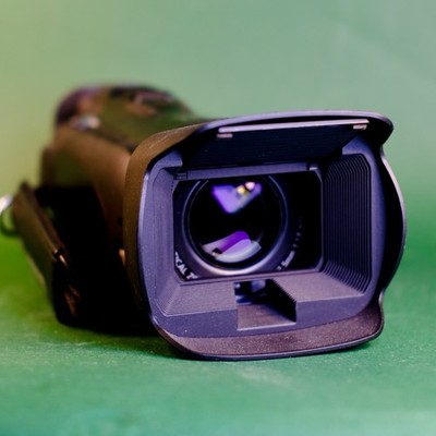 Canon Legria HFG25 HD CAMCORDER Charger, Hood, Student Working