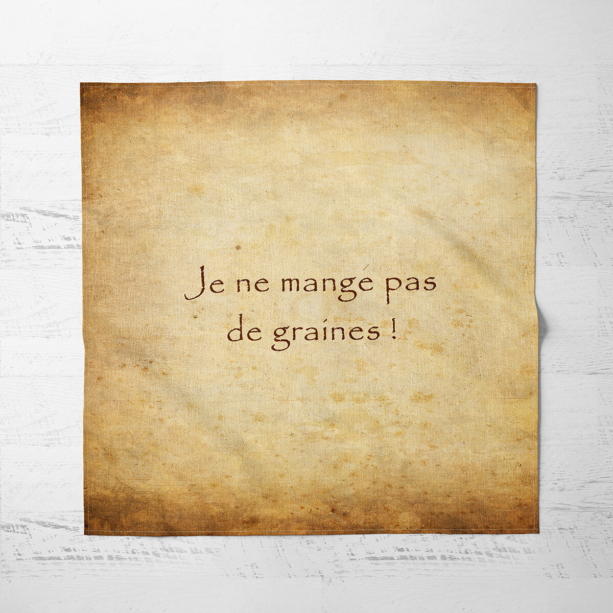 Serviette de table en tissu Kaamelott citation Je ne mange pas de graines en coton blanc 45x45 cm