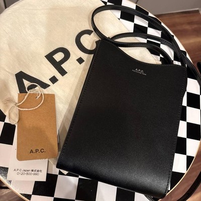 Brand new APC embossed logo shoulder bag, black, with tags and dust bag.