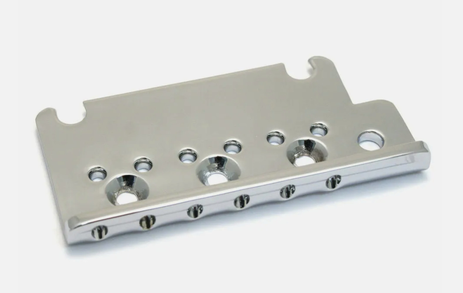 Bridge plate Fender Stratocaster vissant améliore le sustain de guitare