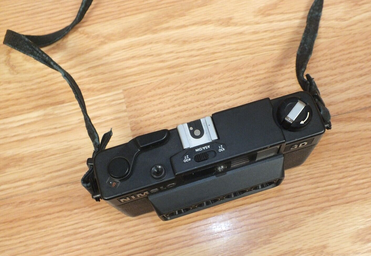 Genuine Vintage Nimslo 3D 35mm Collectible Camera With Strap Genuine Vintage Nimslo 3D 35mm Collectible Camera With Strap