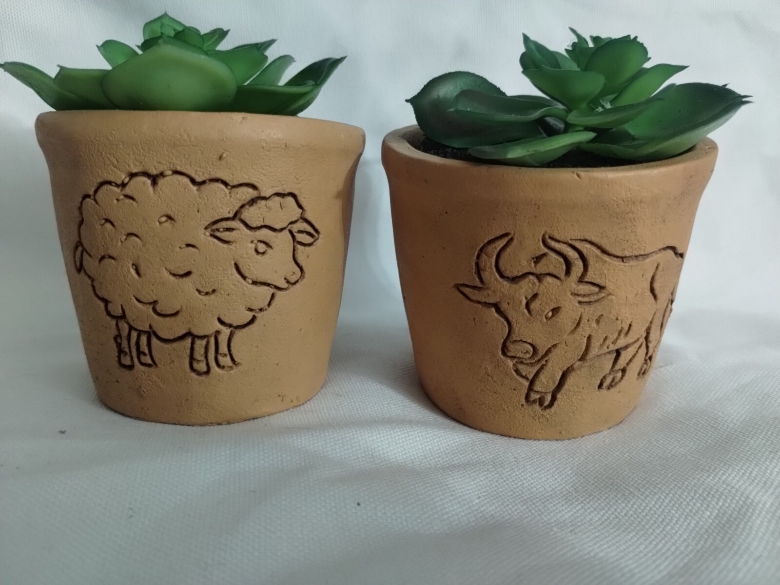 Artificial plants in ceramic pots for stylish home decor  -image