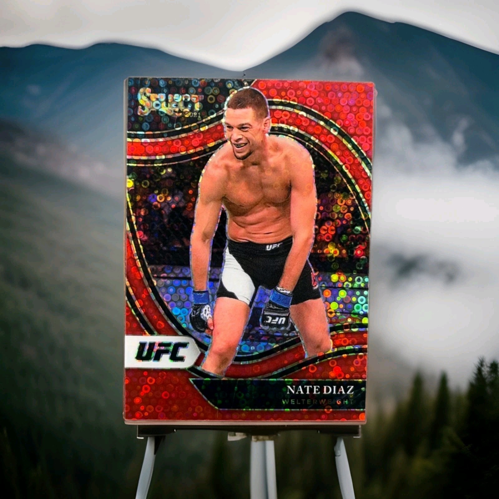 2021 Panini Select UFC Nate Diaz Octagonside Red Disco Prizm /199