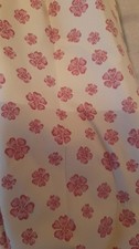A pair of Hilarys Bespoke Pink Flower Curtains