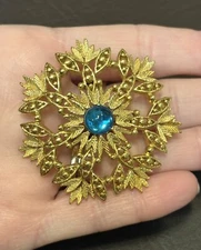 Victorian Revival Brooch Blue Rhinestone Center Gold Tone Filigree Pin