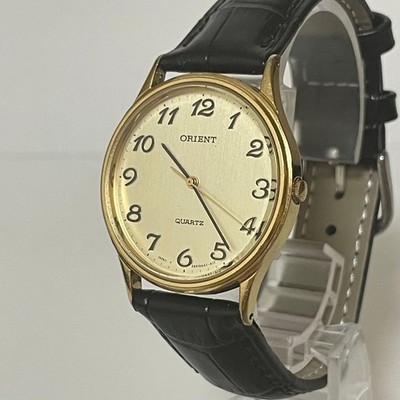 Orient Watch Quartz Gold Dial Black Leather Band Unisex Timepiece Vintage
