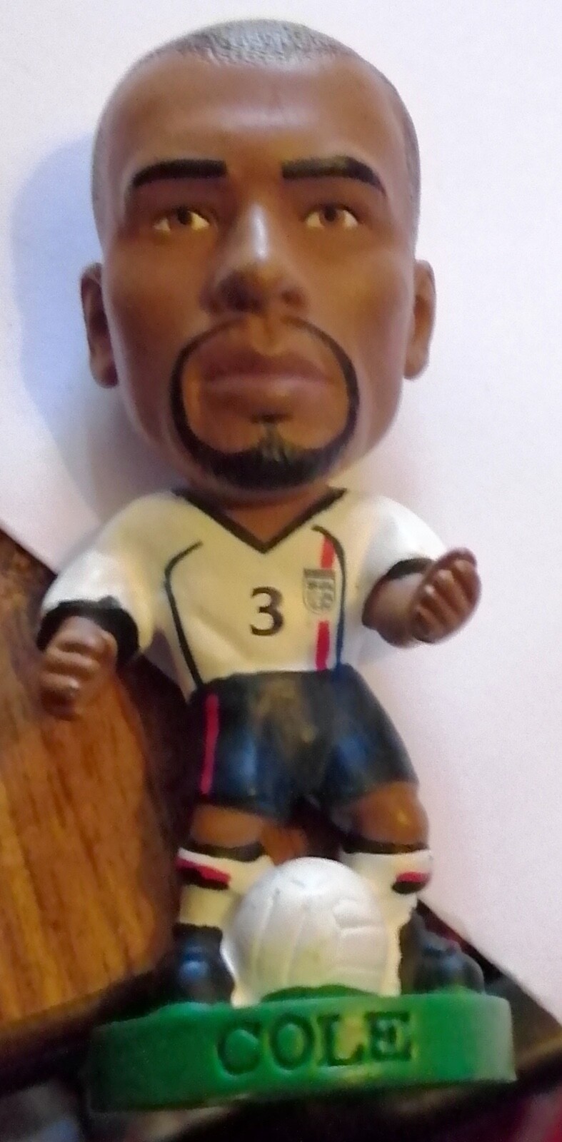 little football figures with big heads