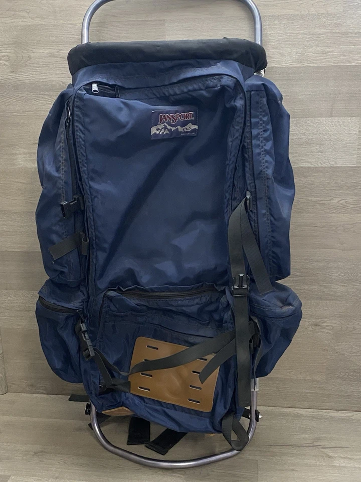 MOCHILA VINTAGE JANSPORT MARCO EXTERNO LIGERA AZUL NAILON Y CUERO Foto 3 de 4