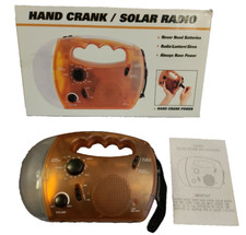 Hand Crank or Solar Flashlight Rechargeable Orange AM/FM radio Siren Preowned