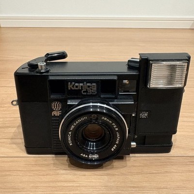 Konica AUTO FOCUS C35 AF F2.8 38mm compact film camera energized, shutter OK