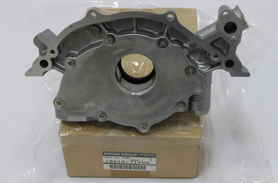 MONTAJE DE BOMBA DE ACEITE ORIGINAL Nissan 1501071V00 Infiniti J30 300ZX 15010-71V00 Foto 2 de 3