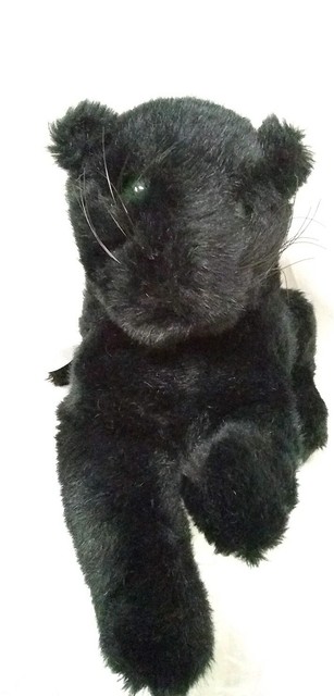 black cat with green eyes stuffed animal