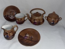 Childs Porcelain Small Tea Set Child Pushing Buggy Boy W/ Trumpet