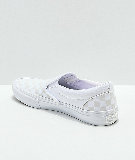 white reflective checkered vans