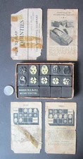 1940s The Embossing Company LINE UP THE QUINTIES SLIDING PUZZLE GAME Baby Flower