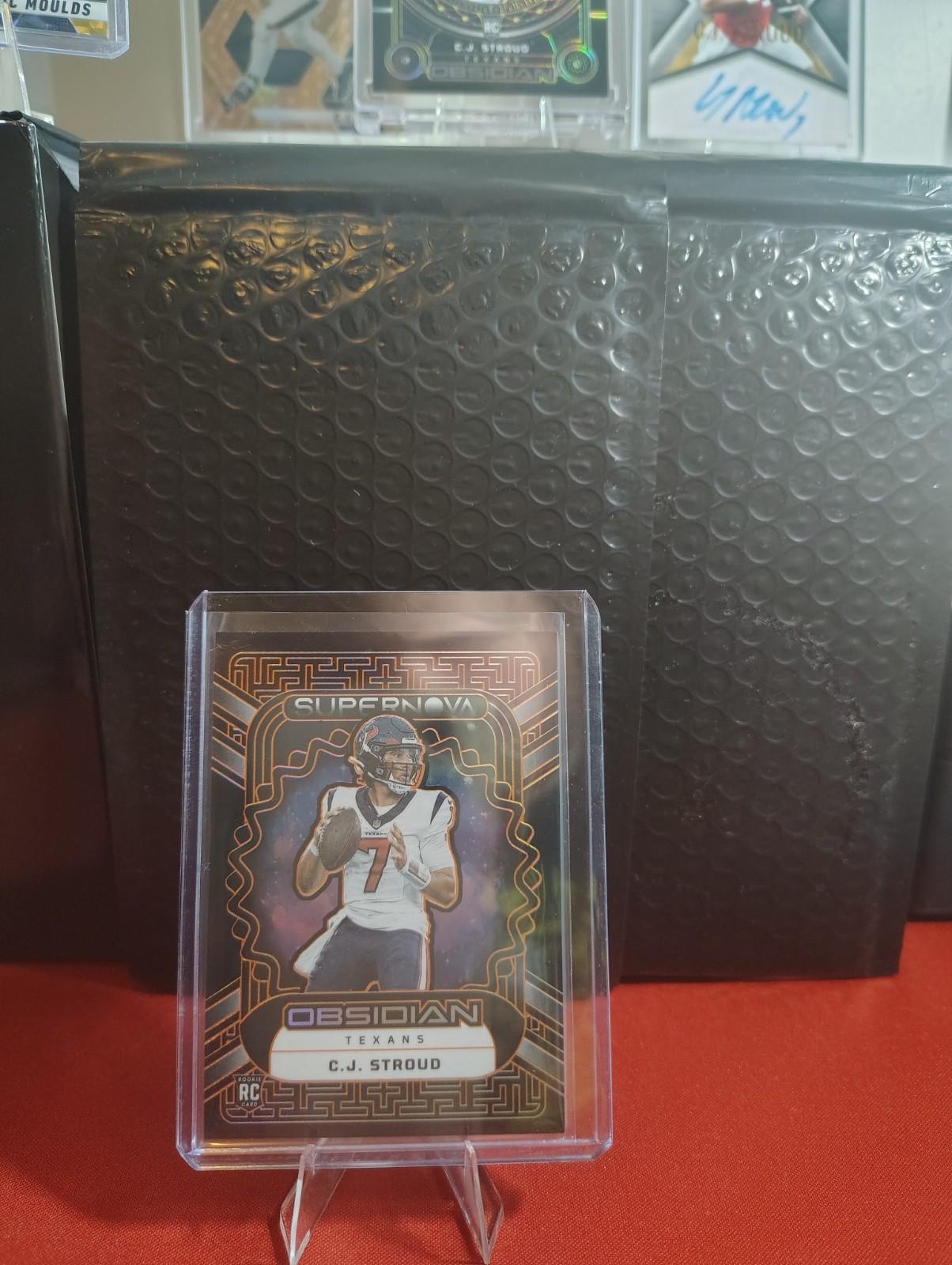 2023 Panini Obsidian - Supernova C.J. Stroud #3 Electric Etch Orange /65 (RC)