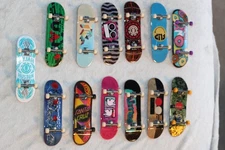 tech deck lot 13 boards. 11 Tech Deck, 1 Hotwheel, and 1 Grizzly