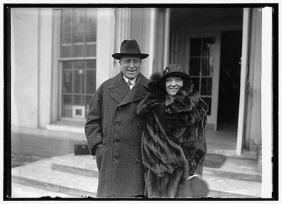 Photo:Wm. Randolph Hearst and Woman Outside Building 1923