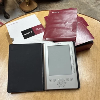 Sony Digital Book Reader PRS-300 Silver Powers On. Glitches Parts Only - Image 1 of 4