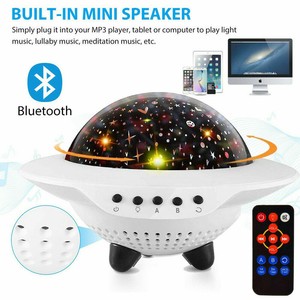 rotating night light projector with music