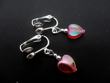 A PAIR OF CUTE LITTLE RED HEART  DANGLY CLIP ON EARRINGS. NEW.