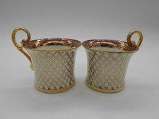 PAIRE DE TASSE  BORDEAUX & OR EN PORCELAINE DE LIMOGES