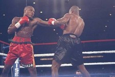 Ike Quartey and Ralph Jones throw a punches at each other at a fig- Old Photo